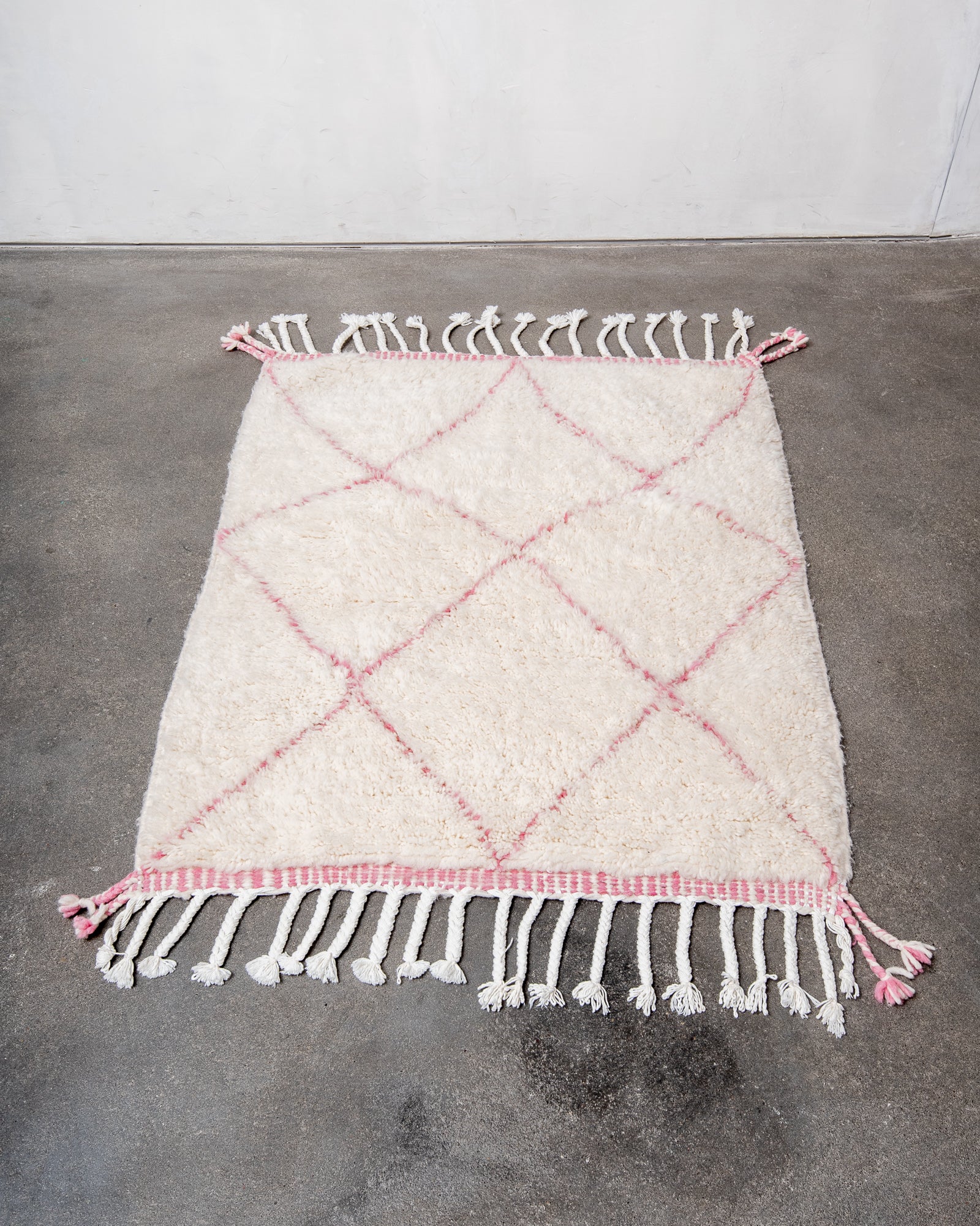 Modern, designer, handcrafted Berber rug from Morocco. Beniourain carpet with beautiful colours and patterns and fluffy wool texture.